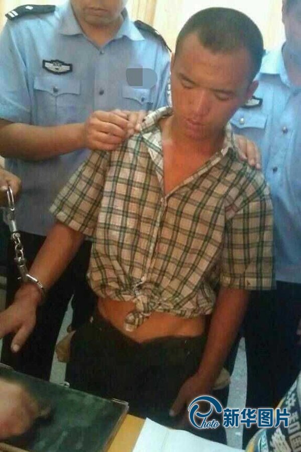 2013年8月20日午間，河南省安陽警方將“8.19公交搶劫案”嫌犯24歲的周江波緝拿歸案。圖片來